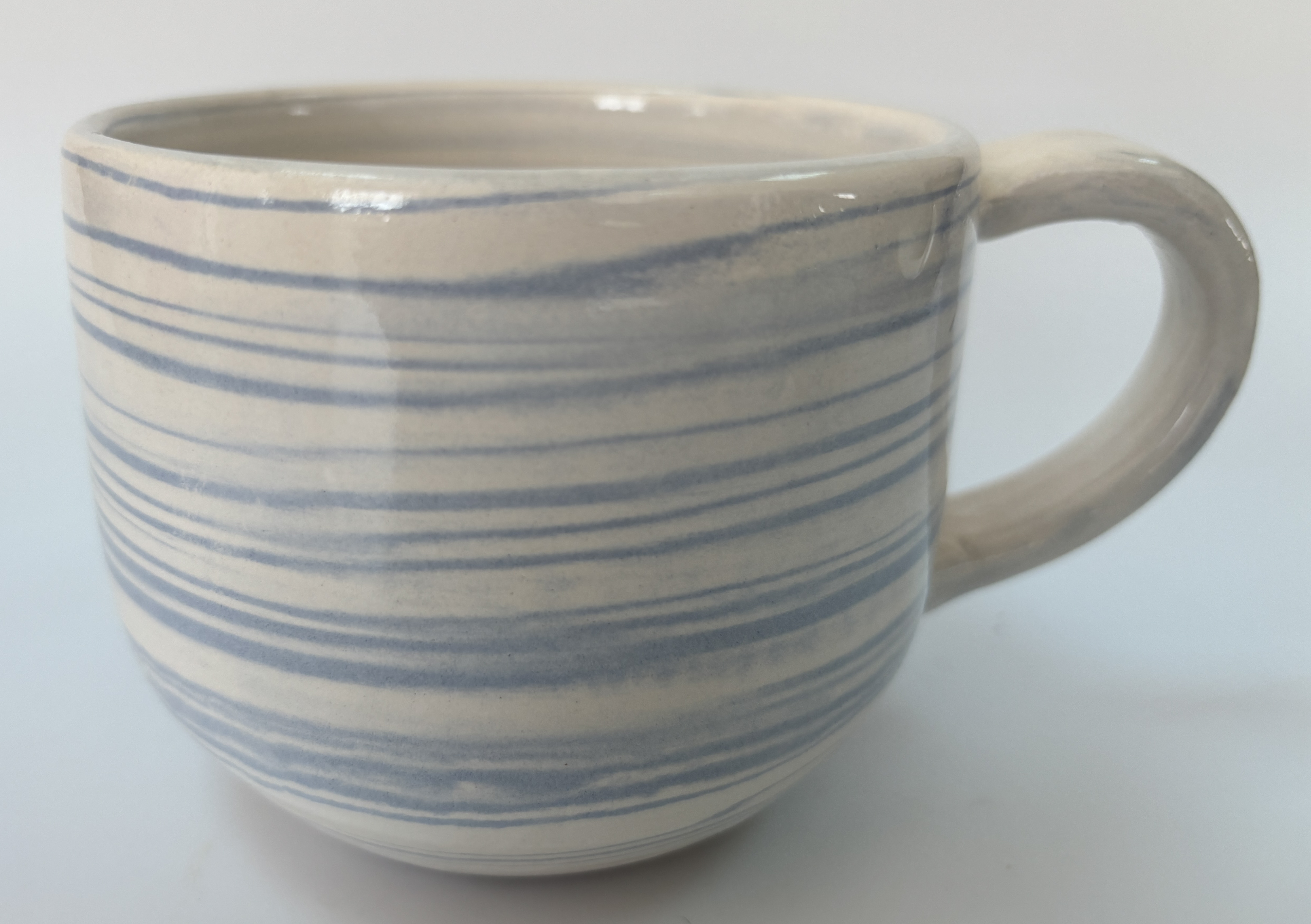 Ceramic mug made from blue and green clay